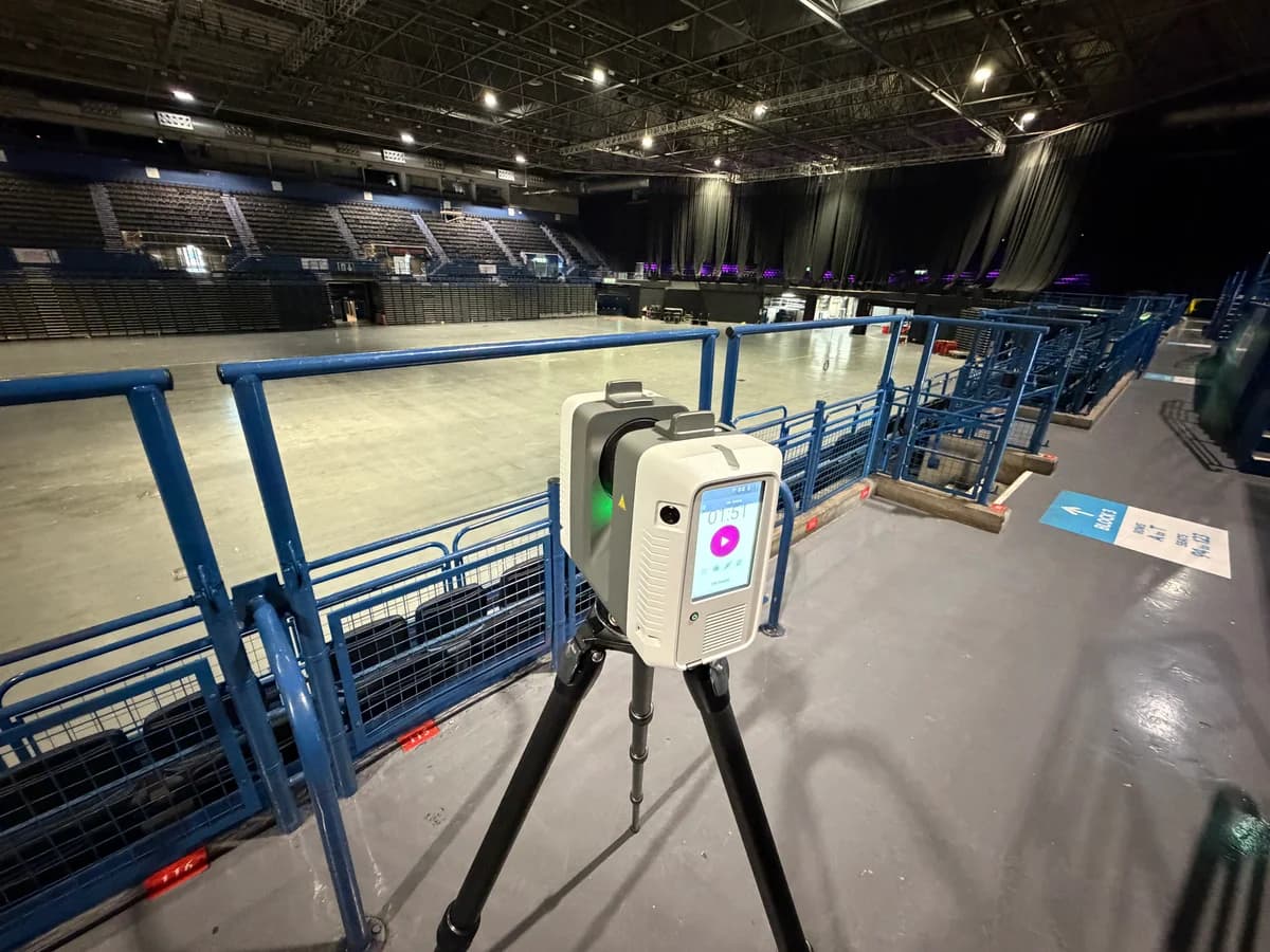 Leica RTC360 laser scanner positioned beside the arena seating